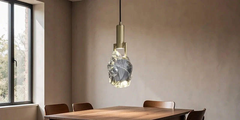 Crystal chandelier over a dining table Crystal chandelier over a dining table